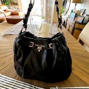 Authentic Prada shoulder handbag. Soft leather with silver hardware.